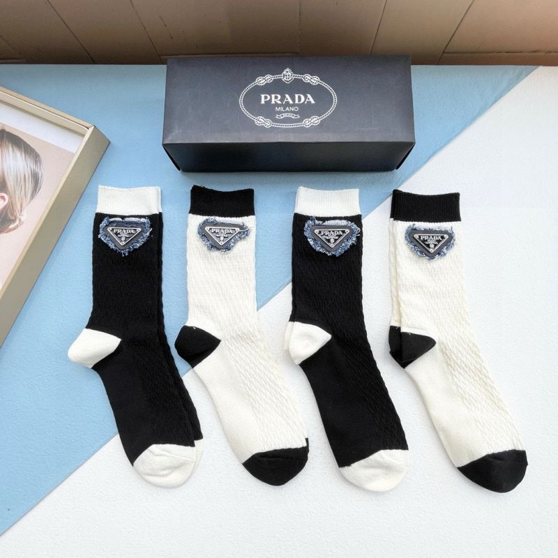 Prada socks ( 4 pairs)